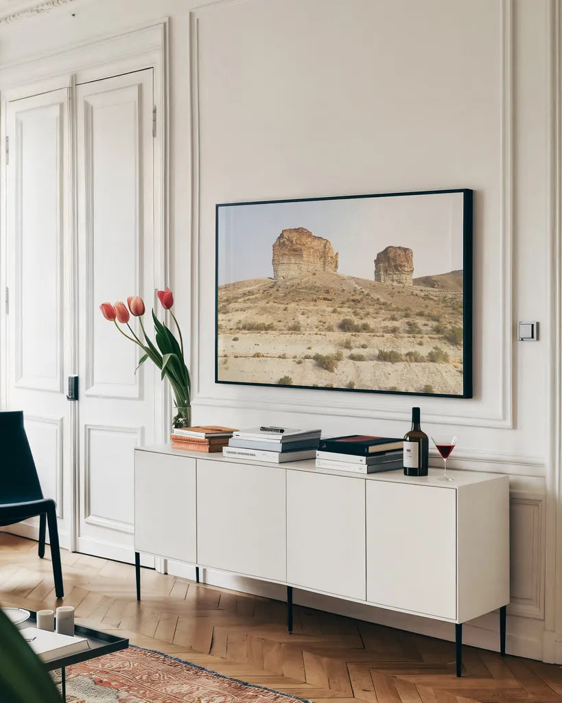 Western Buttes by Wild Apple Portfolio. shown as a framed stretched canvas in a living room above a console. Available as a archival giclee rolled canvas, fine art paper, or poster print. SKU 74443i.