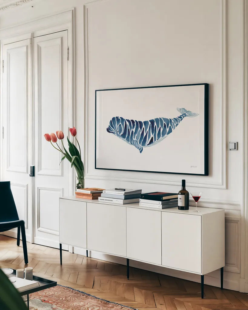 Beluga Whale by Yvette St. Amant. shown as a framed stretched canvas in a living room above a console. Available as a archival giclee rolled canvas, fine art paper, or poster print. SKU 90113i.