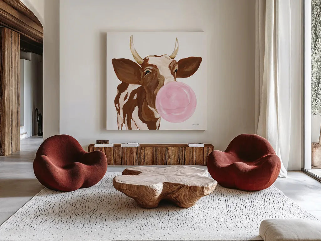 Bubblegum Cow by Yvette St. Amant. Shown as extra-large giant wall art in a modern living room. Available as an archival giclee rolled canvas, fine art paper, or poster print. SKU 91464a.