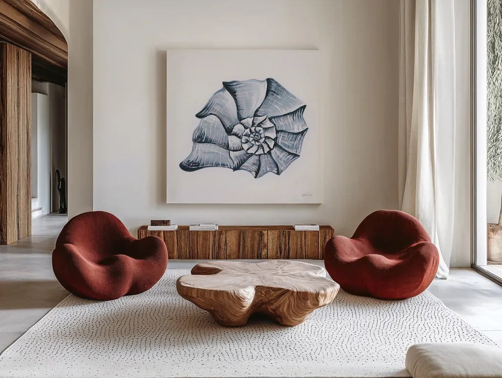 Coastal Harp Shell Navy by Yvette St. Amant. Shown as extra-large giant wall art in a modern living room. Available as an archival giclee rolled canvas, fine art paper, or poster print. SKU 91167a.