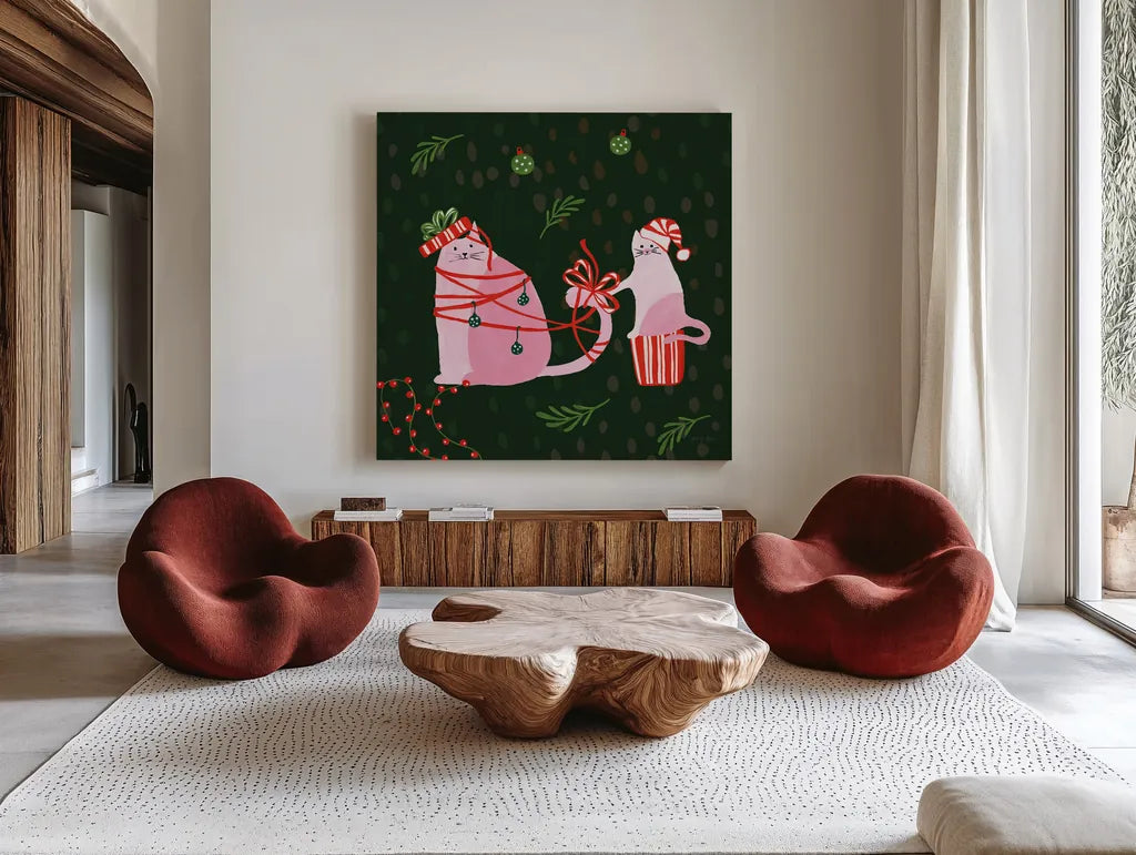 Mischief Kitty Christmas IV by Yvette St. Amant. Shown as extra-large giant wall art in a modern living room. Available as an archival giclee rolled canvas, fine art paper, or poster print. SKU 97543a.