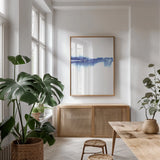 Blue Horizon II by Aimee Del Valle. shown as a print in a natural wood frame in a dining room. Available as a archival giclee rolled canvas, fine art paper, or poster print. SKU 68322h.