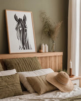 Le Cheval Noir by Aimee Del Valle. shown as a paper print in a natural frame. Available as a archival giclee rolled canvas, fine art paper, or poster print. SKU 45779h.
