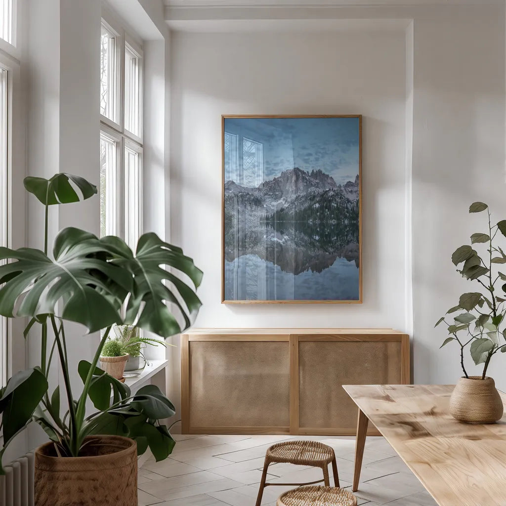 Baron Lake Monte Verita Peak Sawtooth Mountains I by Alan Majchrowicz. shown as a print in a natural wood frame in a dining room. Available as a archival giclee rolled canvas, fine art paper, or poster print. SKU 81521h.