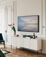 Bellingham Bay Clouds Reflection II by Alan Majchrowicz. shown as a framed stretched canvas in a living room above a console. Available as a archival giclee rolled canvas, fine art paper, or poster print. SKU 61442i.