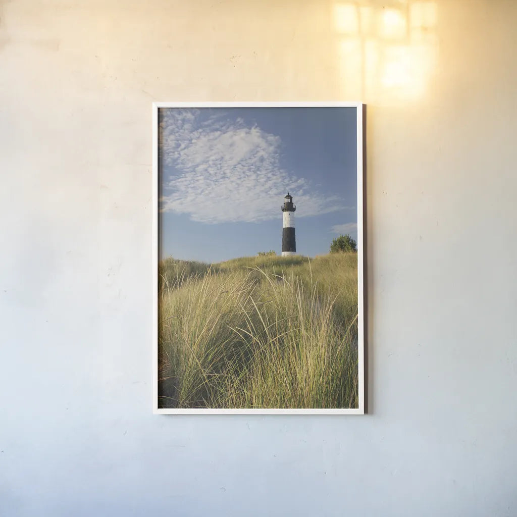 Big Sable Point Lighthouse I by Alan Majchrowicz. shown as a paper print in a white frame. Available as a archival giclee rolled canvas, fine art paper, or poster print. SKU 50032h.