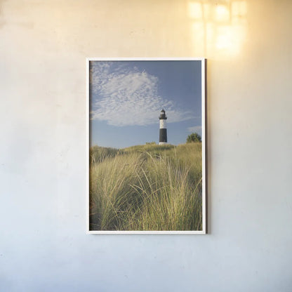 Big Sable Point Lighthouse I by Alan Majchrowicz. shown as a paper print in a white frame. Available as a archival giclee rolled canvas, fine art paper, or poster print. SKU 50032h.
