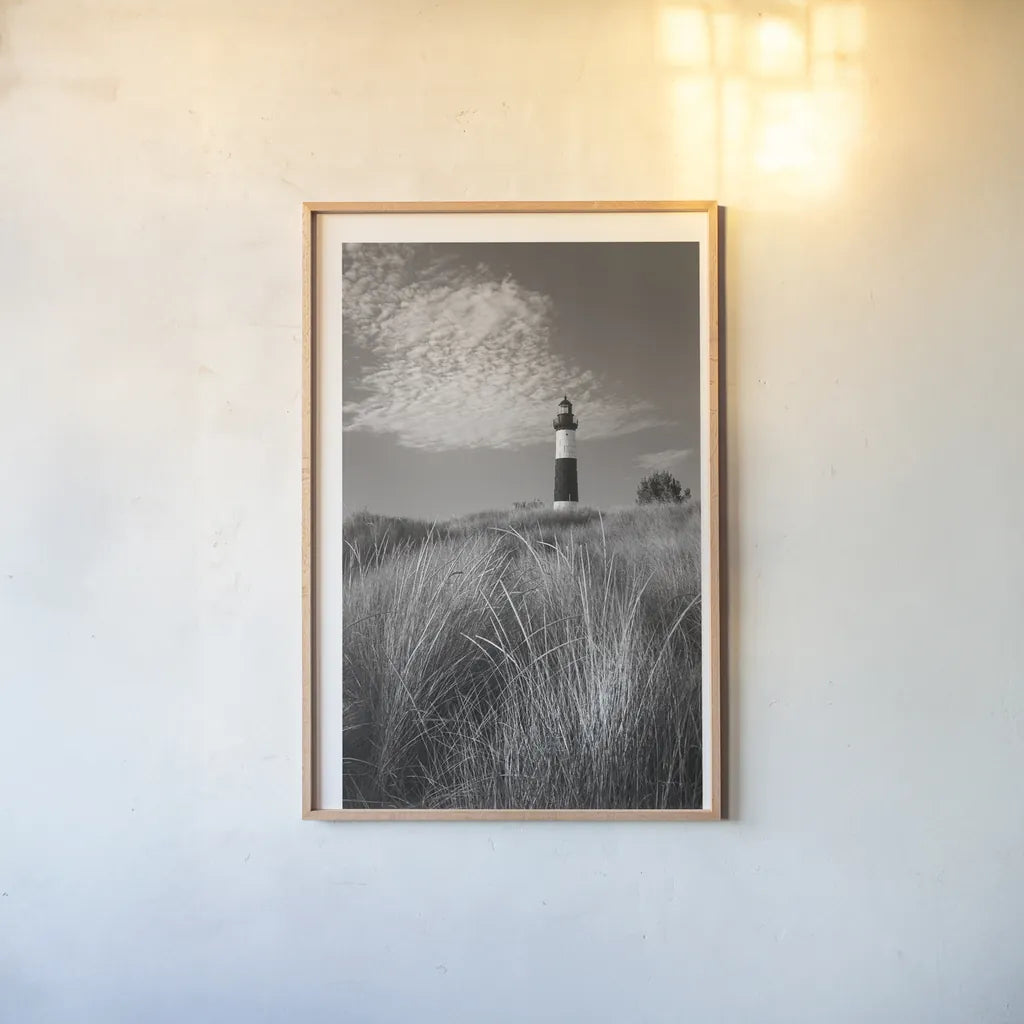 Big Sable Point Lighthouse I BW by Alan Majchrowicz. shown as a paper print in a natural frame. Available as a archival giclee rolled canvas, fine art paper, or poster print. SKU 50034h.