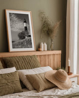 Big Sable Point Lighthouse II BW by Alan Majchrowicz. shown as a paper print in a natural frame. Available as a archival giclee rolled canvas, fine art paper, or poster print. SKU 50035h.
