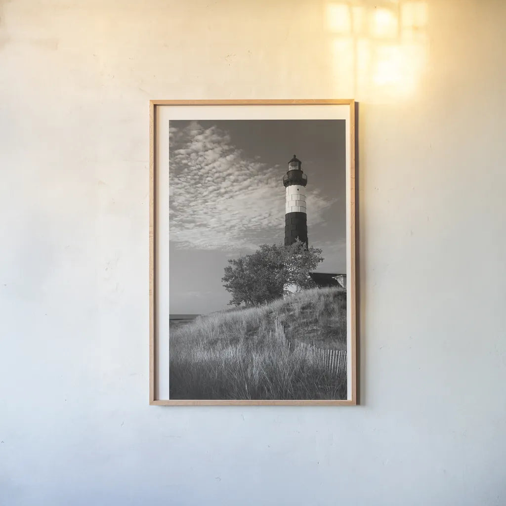 Big Sable Point Lighthouse II BW by Alan Majchrowicz. shown as a paper print in a natural frame. Available as a archival giclee rolled canvas, fine art paper, or poster print. SKU 50035h.