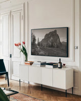 Boulder Pass Glacier National Park BW by Alan Majchrowicz. shown as a framed stretched canvas in a living room above a console. Available as a archival giclee rolled canvas, fine art paper, or poster print. SKU 71342i.