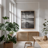 Clearing Storm on Washington Coast I by Alan Majchrowicz. shown as a print in a natural wood frame in a dining room. Available as a archival giclee rolled canvas, fine art paper, or poster print. SKU 43952h.