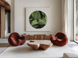 Corn Lily Circle I by Alan Majchrowicz. Shown as extra-large giant wall art in a modern living room. Available as an archival giclee rolled canvas, fine art paper, or poster print. SKU 66121a.