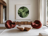 Corn Lily Circle II by Alan Majchrowicz. Shown as extra-large giant wall art in a modern living room. Available as an archival giclee rolled canvas, fine art paper, or poster print. SKU 66122a.