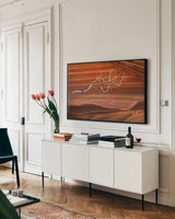 Coyote Buttes III by Alan Majchrowicz. shown as a framed stretched canvas in a living room above a console. Available as a archival giclee rolled canvas, fine art paper, or poster print. SKU 53282i.