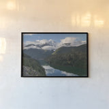 Diablo Lake and Colonial Peak by Alan Majchrowicz. shown as a paper print in a black flame. Available as a archival giclee rolled canvas, fine art paper, or poster print. SKU 101145i.
