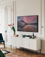 Emerald Lake by Alan Majchrowicz. shown as a framed stretched canvas in a living room above a console. Available as a archival giclee rolled canvas, fine art paper, or poster print. SKU 90658i.