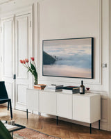 Fog and Forest III by Alan Majchrowicz. shown as a framed stretched canvas in a living room above a console. Available as a archival giclee rolled canvas, fine art paper, or poster print. SKU 77236i.