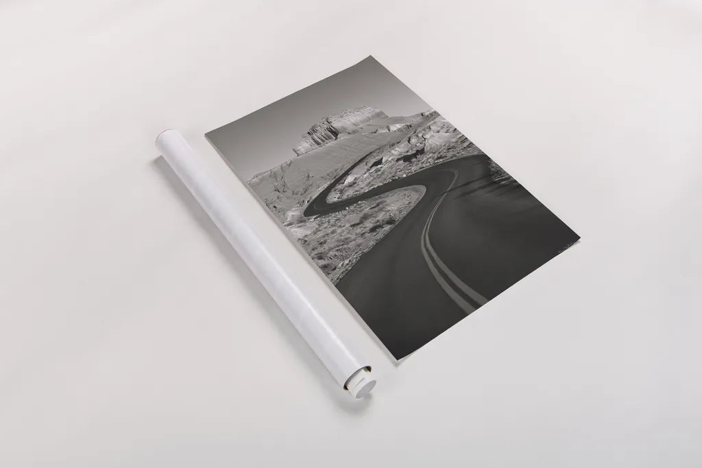 Goblin Valley State Park Rd BW by Alan Majchrowicz. shown as a rolled paper print. Available as archival giclee rolled canvas, fine art paper, or poster print. SKU 81527h.