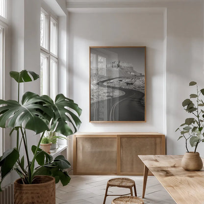 Goblin Valley State Park Rd BW by Alan Majchrowicz. shown as a print in a natural wood frame in a dining room. Available as a archival giclee rolled canvas, fine art paper, or poster print. SKU 81527h.