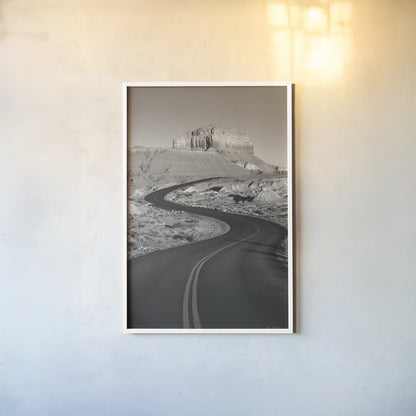 Goblin Valley State Park Rd BW by Alan Majchrowicz. shown as a paper print in a white frame. Available as a archival giclee rolled canvas, fine art paper, or poster print. SKU 81527h.