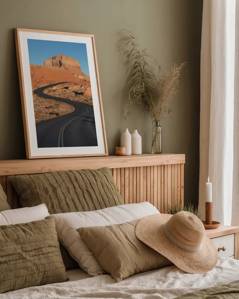 Goblin Valley State Park Road by Alan Majchrowicz. shown as a paper print in a natural frame. Available as a archival giclee rolled canvas, fine art paper, or poster print. SKU 81526h.