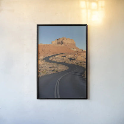 Goblin Valley State Park Road by Alan Majchrowicz. shown as a paper print in a black flame. Available as a archival giclee rolled canvas, fine art paper, or poster print. SKU 81526h.