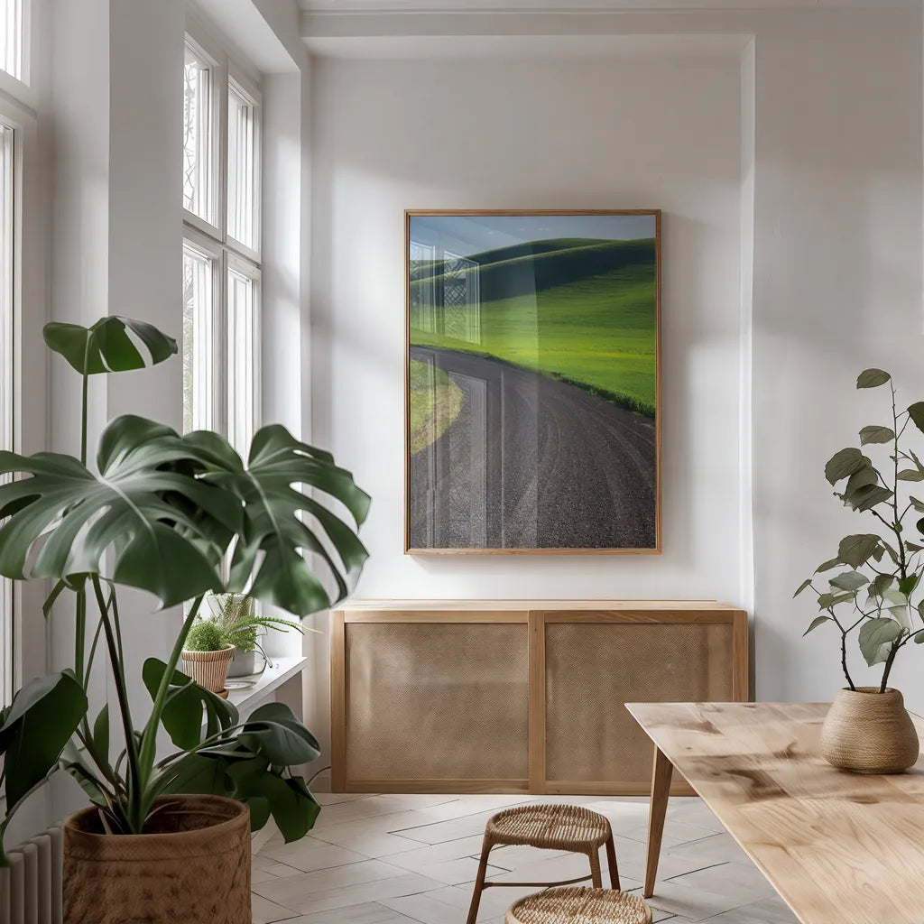Going Through Palouse Wheat Fields by Alan Majchrowicz. shown as a print in a natural wood frame in a dining room. Available as a archival giclee rolled canvas, fine art paper, or poster print. SKU 62464h.