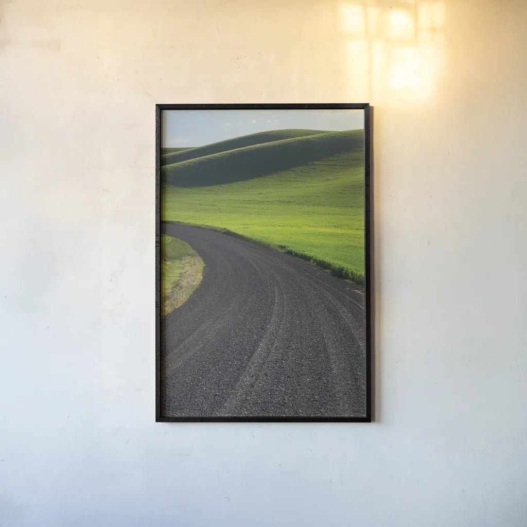 Going Through Palouse Wheat Fields by Alan Majchrowicz. shown as a paper print in a black flame. Available as a archival giclee rolled canvas, fine art paper, or poster print. SKU 62464h.