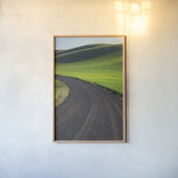 Going Through Palouse Wheat Fields by Alan Majchrowicz. shown as a paper print in a natural frame. Available as a archival giclee rolled canvas, fine art paper, or poster print. SKU 62464h.