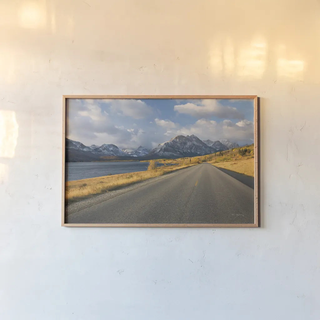 Going To The Sun Road by Alan Majchrowicz. shown as a paper print in a natural frame. Available as a archival giclee rolled canvas, fine art paper, or poster print. SKU 62465i.
