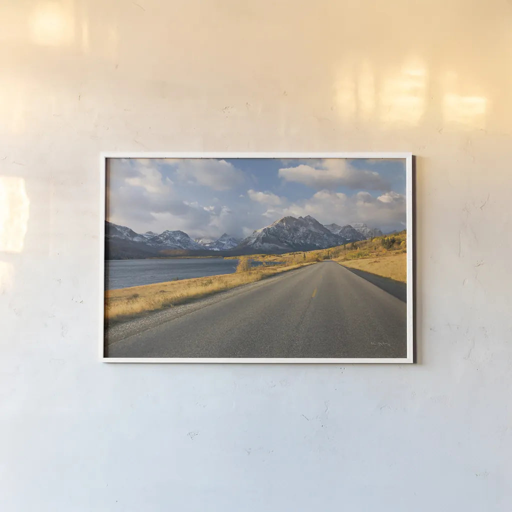 Going To The Sun Road by Alan Majchrowicz. shown as a paper print in a white frame. Available as a archival giclee rolled canvas, fine art paper, or poster print. SKU 62465i.