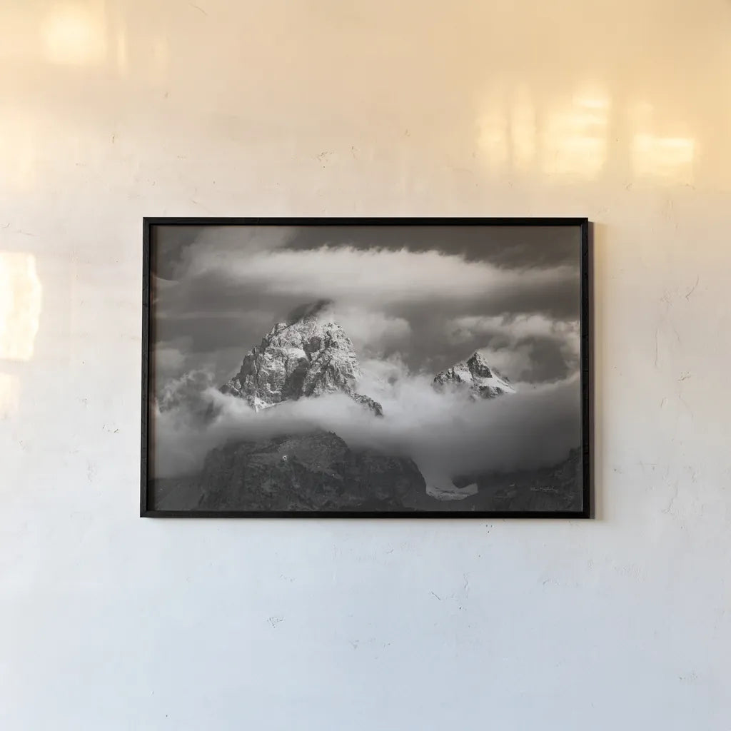 Grand Teton Clouds by Alan Majchrowicz. shown as a paper print in a black flame. Available as a archival giclee rolled canvas, fine art paper, or poster print. SKU 64540i.