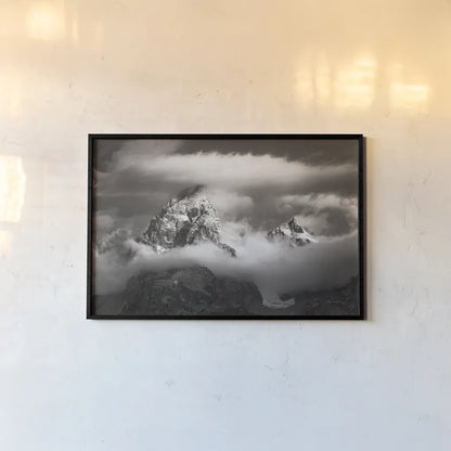 Grand Teton Clouds by Alan Majchrowicz. shown as a paper print in a black flame. Available as a archival giclee rolled canvas, fine art paper, or poster print. SKU 64540i.