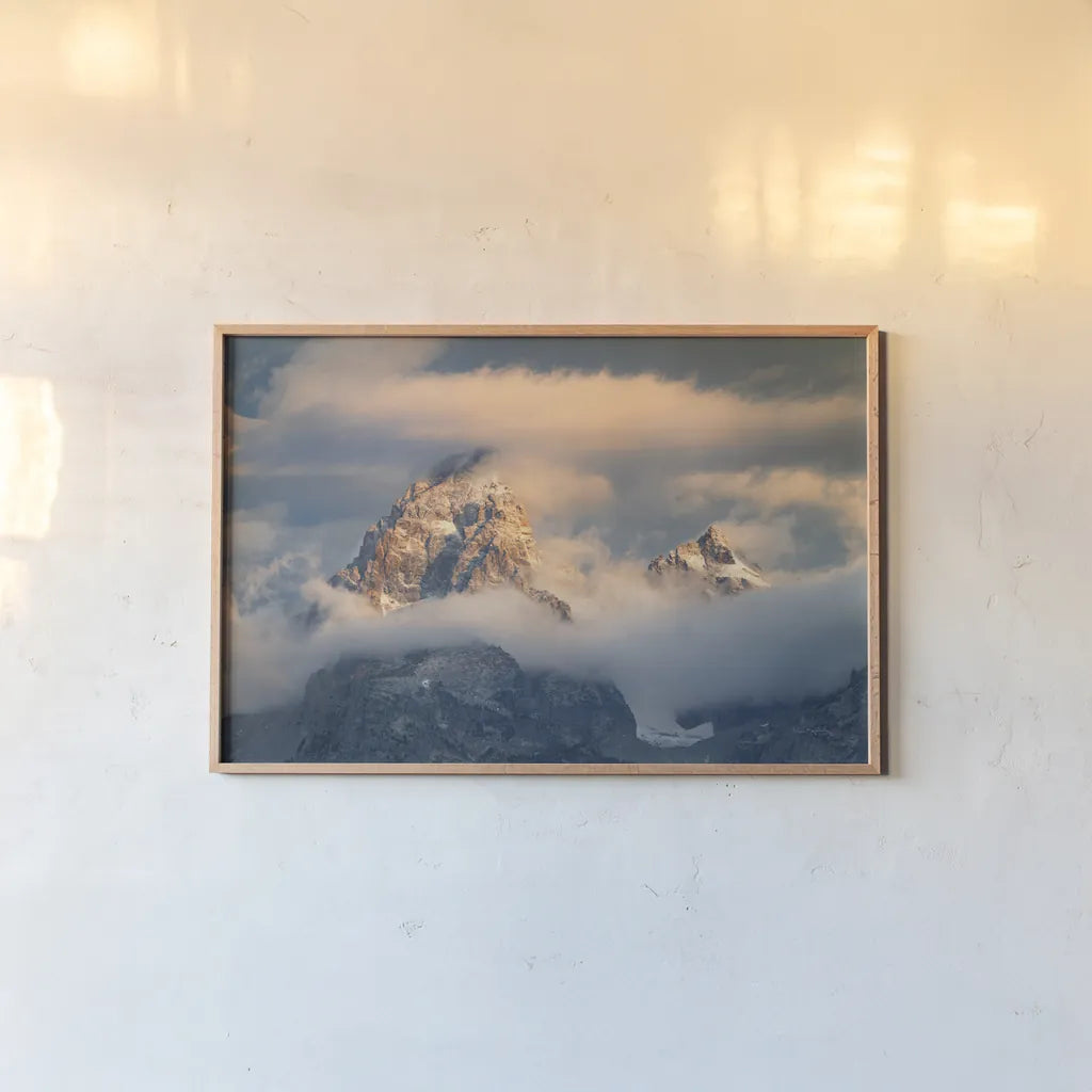 Grand Teton Clouds Color by Alan Majchrowicz. shown as a paper print in a natural frame. Available as a archival giclee rolled canvas, fine art paper, or poster print. SKU 78028i.