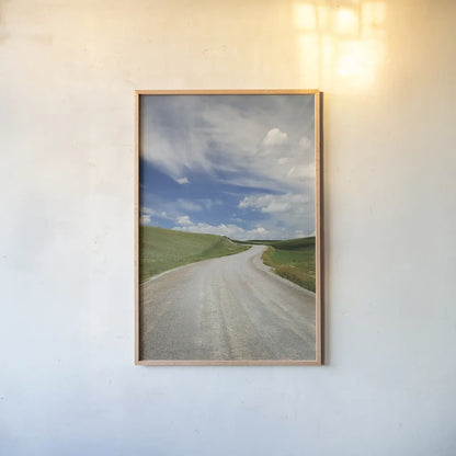 Gravel Road Near Choteau Montana II by Alan Majchrowicz. shown as a paper print in a natural frame. Available as a archival giclee rolled canvas, fine art paper, or poster print. SKU 62461h.
