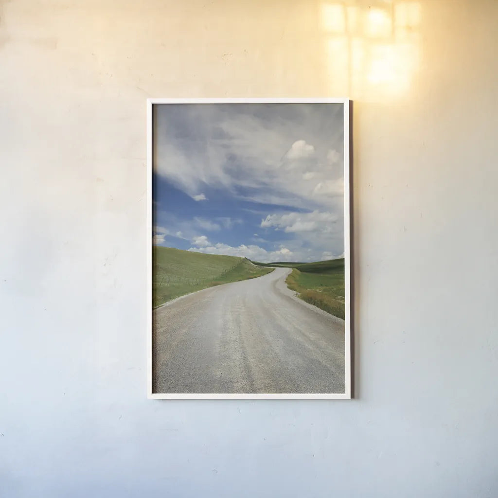 Gravel Road Near Choteau Montana II by Alan Majchrowicz. shown as a paper print in a white frame. Available as a archival giclee rolled canvas, fine art paper, or poster print. SKU 62461h.