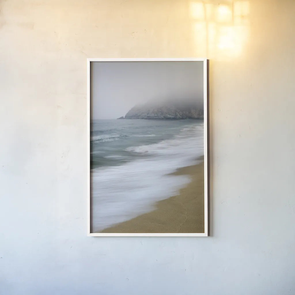 Gray Whale Cove by Alan Majchrowicz. shown as a paper print in a white frame. Available as a archival giclee rolled canvas, fine art paper, or poster print. SKU 46107h.