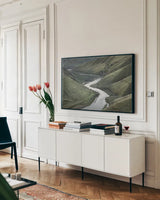 John Day River Oregon I by Alan Majchrowicz. shown as a framed stretched canvas in a living room above a console. Available as a archival giclee rolled canvas, fine art paper, or poster print. SKU 63236i.