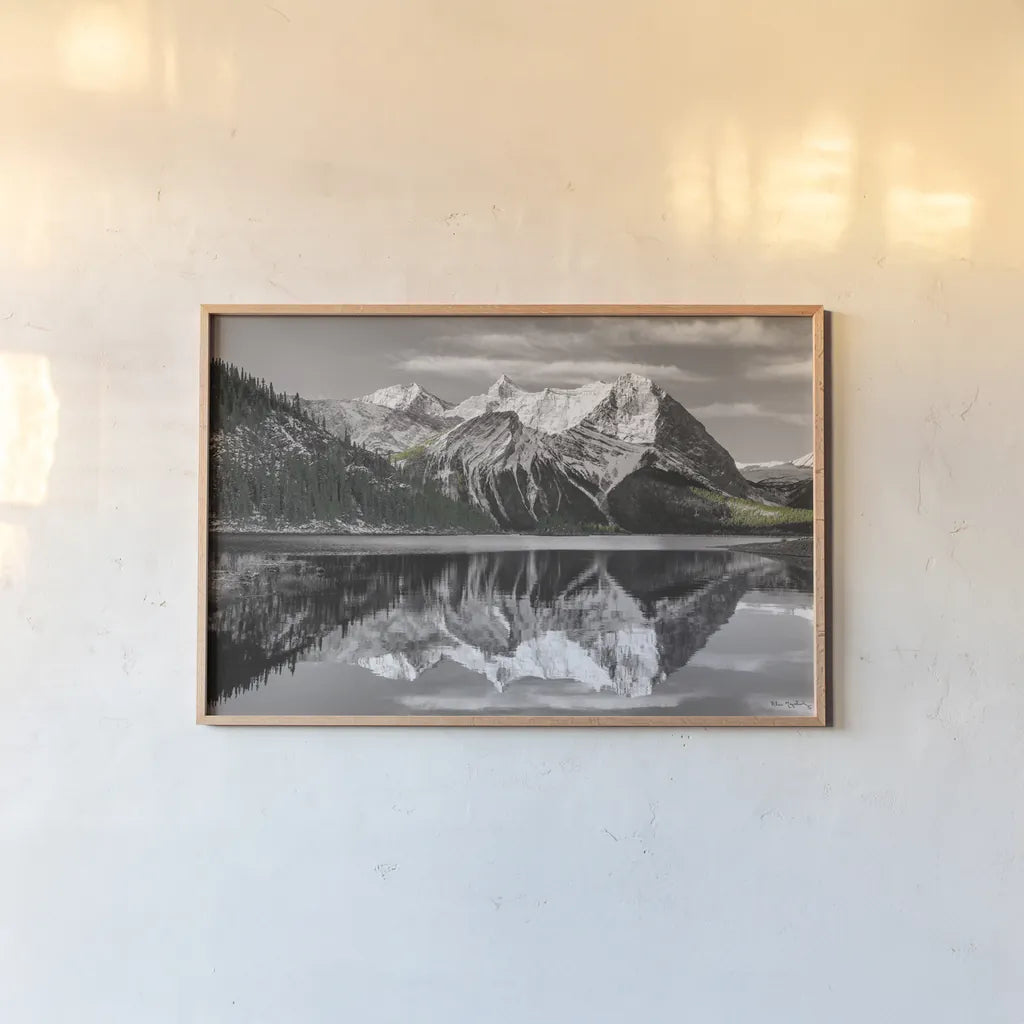 Kananaskis Lake Reflection BW with Color by Alan Majchrowicz. shown as a paper print in a natural frame. Available as a archival giclee rolled canvas, fine art paper, or poster print. SKU 28185i.
