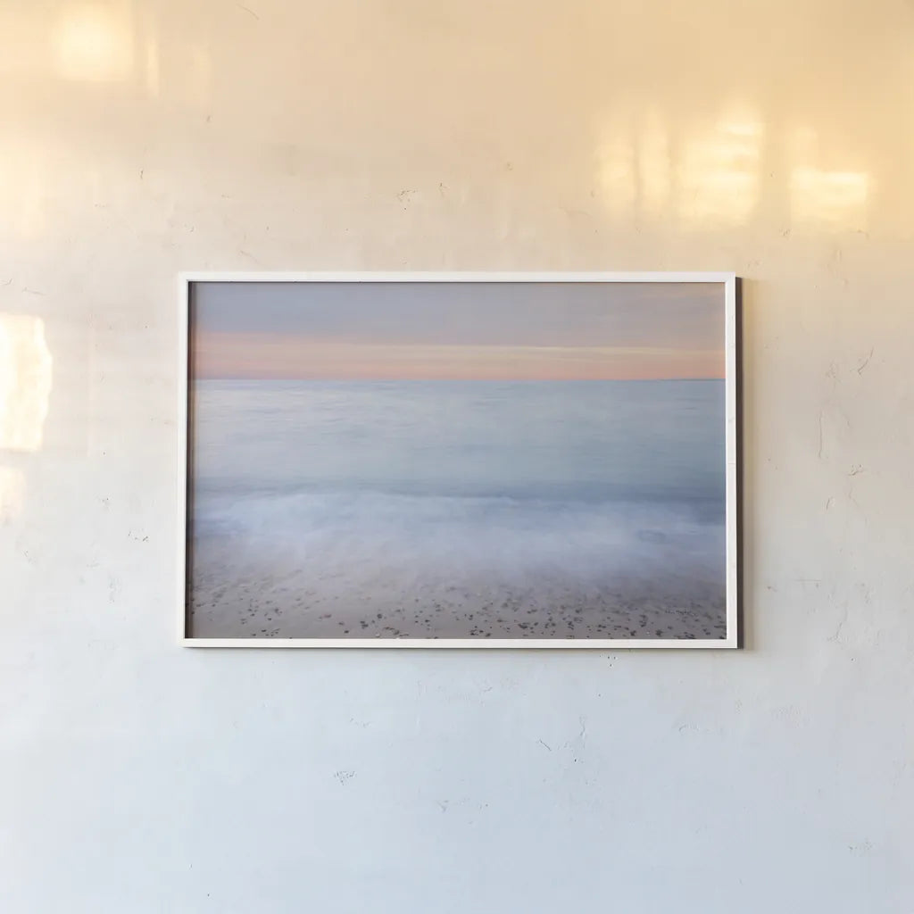 Lake Superior Beach II Sunset by Alan Majchrowicz. shown as a paper print in a white frame. Available as a archival giclee rolled canvas, fine art paper, or poster print. SKU 81458i.