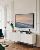 Lake Superior Beach III by Alan Majchrowicz. shown as a framed stretched canvas in a living room above a console. Available as a archival giclee rolled canvas, fine art paper, or poster print. SKU 50397i.
