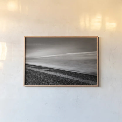 Lake Superior Beach III BW by Alan Majchrowicz. shown as a paper print in a natural frame. Available as a archival giclee rolled canvas, fine art paper, or poster print. SKU 50401i.
