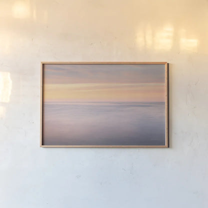 Lake Superior Clouds I by Alan Majchrowicz. shown as a paper print in a natural frame. Available as a archival giclee rolled canvas, fine art paper, or poster print. SKU 50384i.