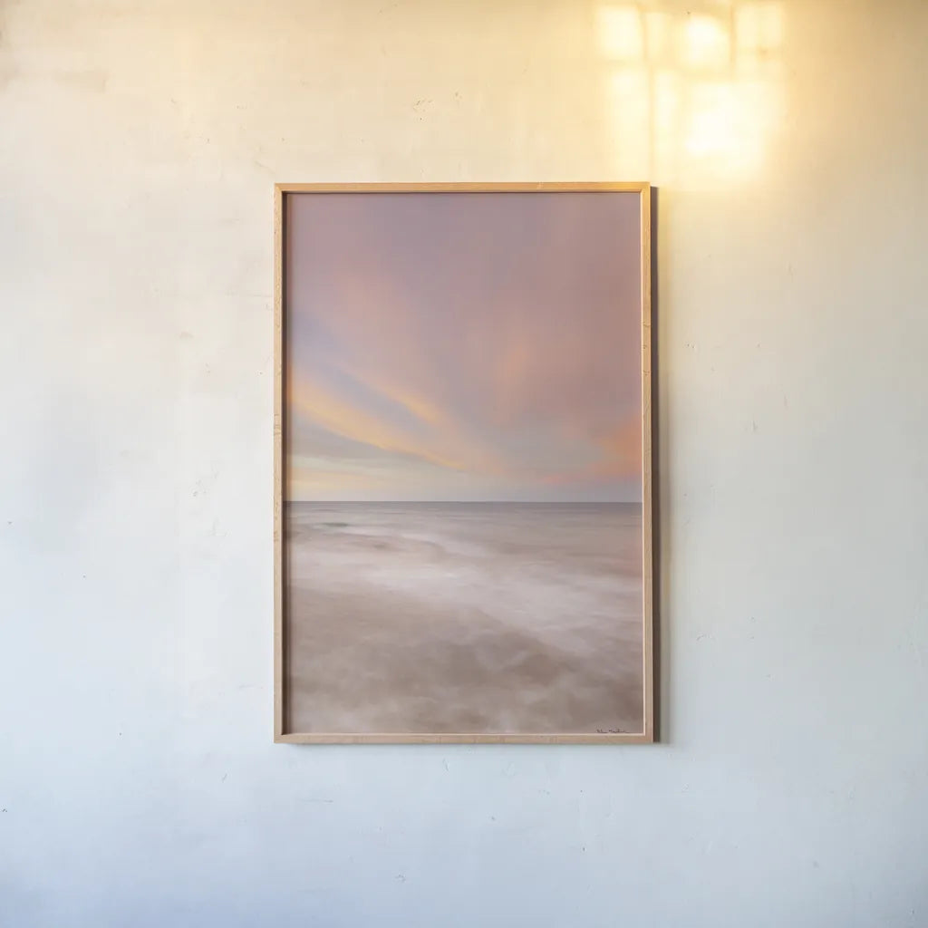 Lake Superior Clouds IV by Alan Majchrowicz. shown as a paper print in a natural frame. Available as a archival giclee rolled canvas, fine art paper, or poster print. SKU 50387h.