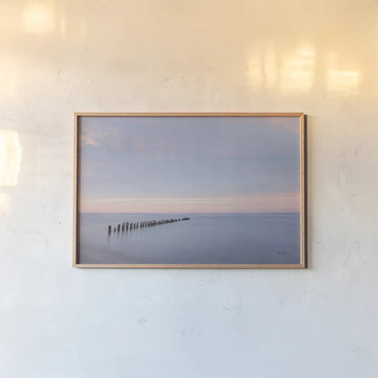 Lake Superior Old Pier II by Alan Majchrowicz. shown as a paper print in a natural frame. Available as a archival giclee rolled canvas, fine art paper, or poster print. SKU 50404i.