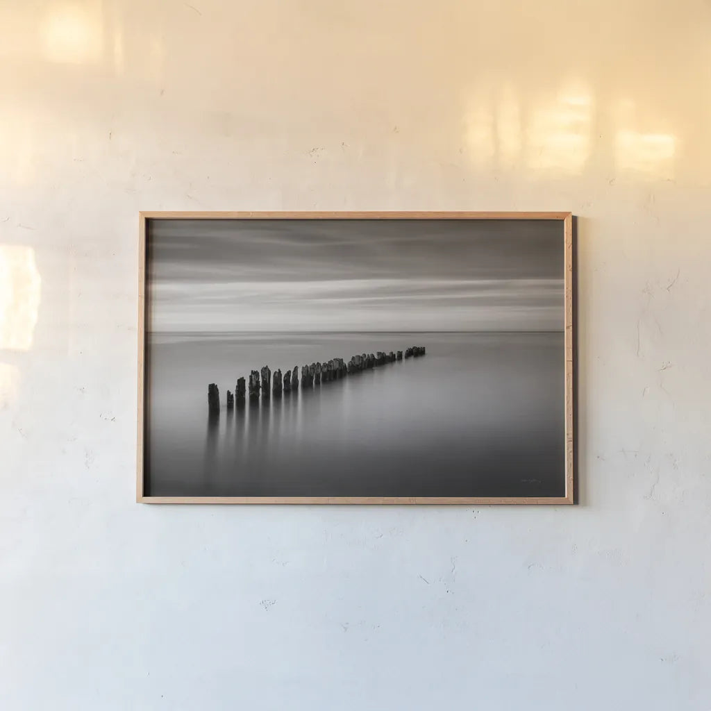 Lake Superior Old Pier III Crop by Alan Majchrowicz. shown as a paper print in a natural frame. Available as a archival giclee rolled canvas, fine art paper, or poster print. SKU 50405i.