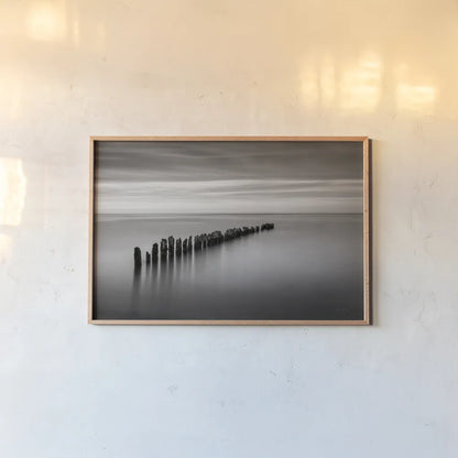 Lake Superior Old Pier III Crop by Alan Majchrowicz. shown as a paper print in a natural frame. Available as a archival giclee rolled canvas, fine art paper, or poster print. SKU 50405i.