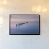 Lake Superior Old Pier IV by Alan Majchrowicz. shown as a paper print in a black flame. Available as a archival giclee rolled canvas, fine art paper, or poster print. SKU 50406i.