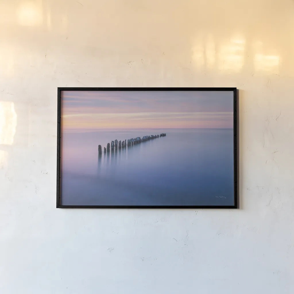 Lake Superior Old Pier IV by Alan Majchrowicz. shown as a paper print in a black flame. Available as a archival giclee rolled canvas, fine art paper, or poster print. SKU 50406i.